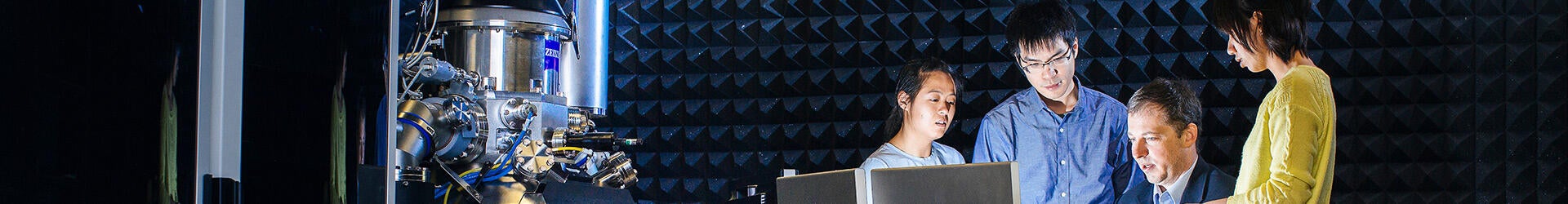 Students working with professor