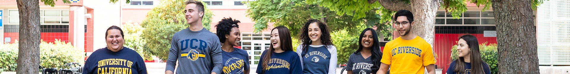 Group of UCR students walking on campus