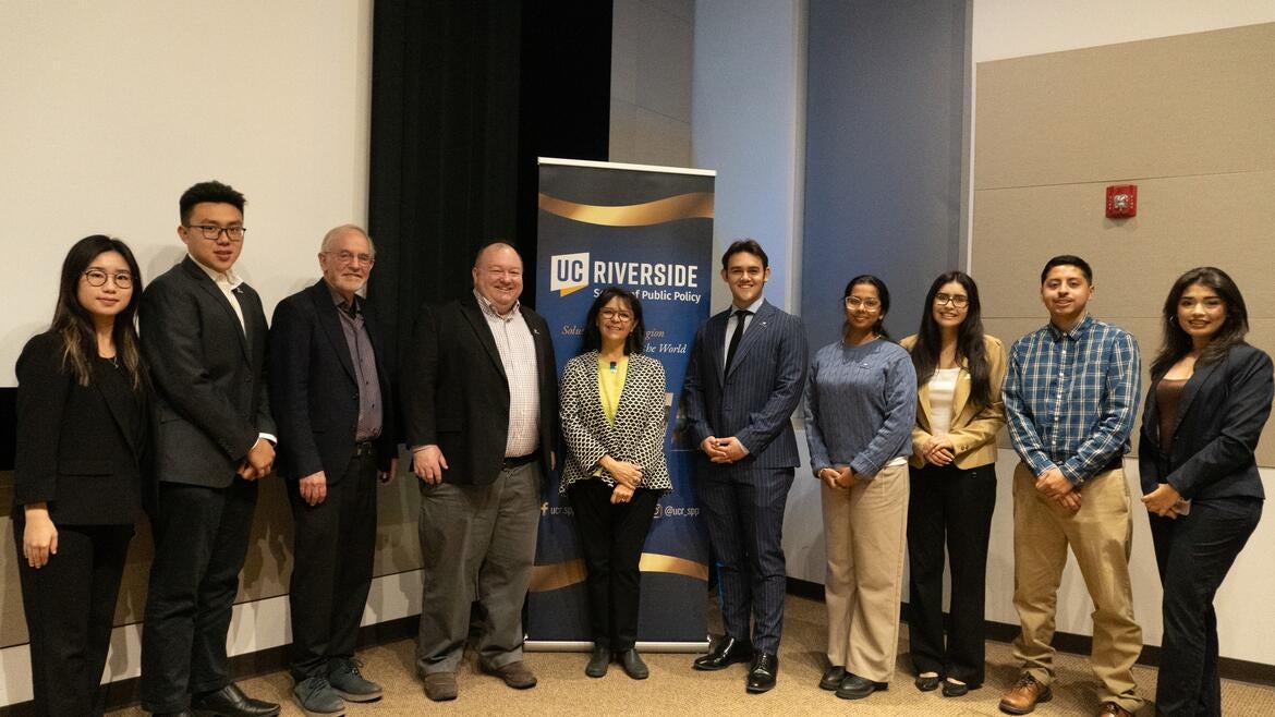 Students with speaker Cecilia Menjivar