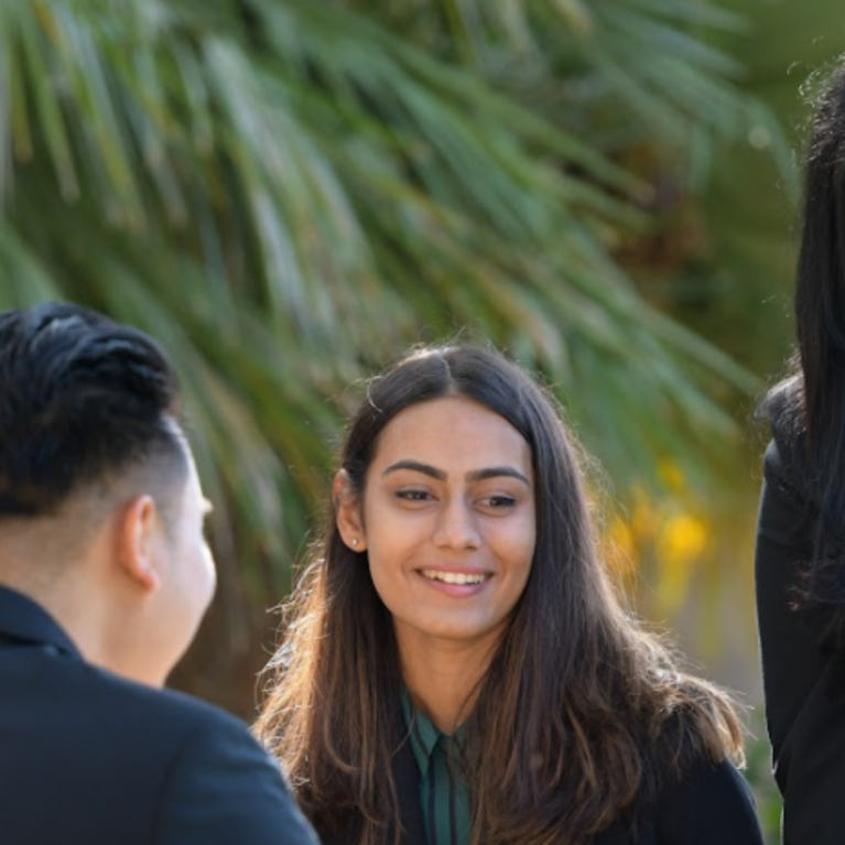 Grad students at Anderson Hall, UCR School of Business