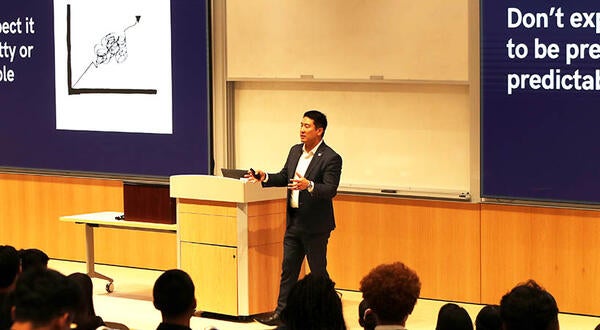 Speaker Larry Chung in the UCR School of Business auditorium