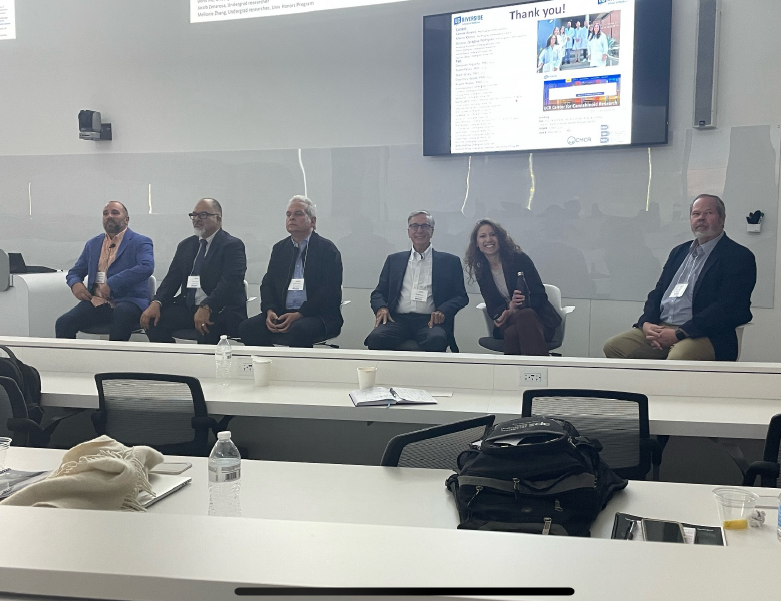 panel at the front of a room