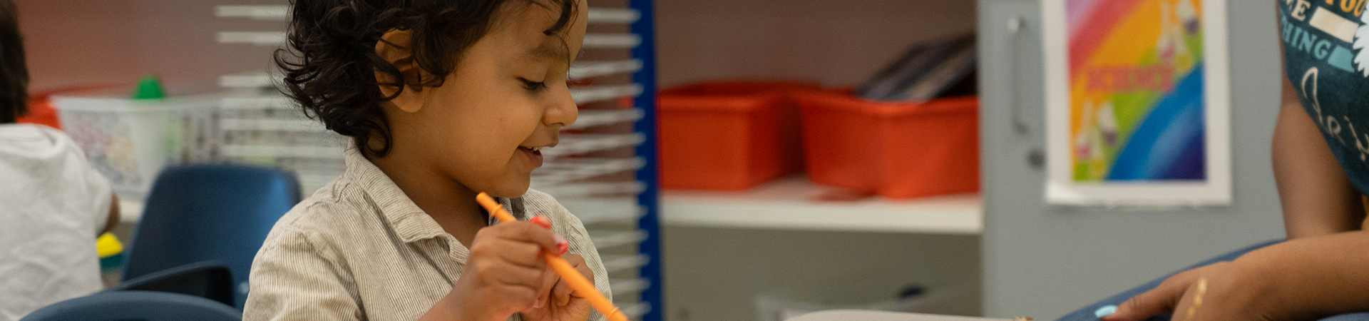 child painting at table