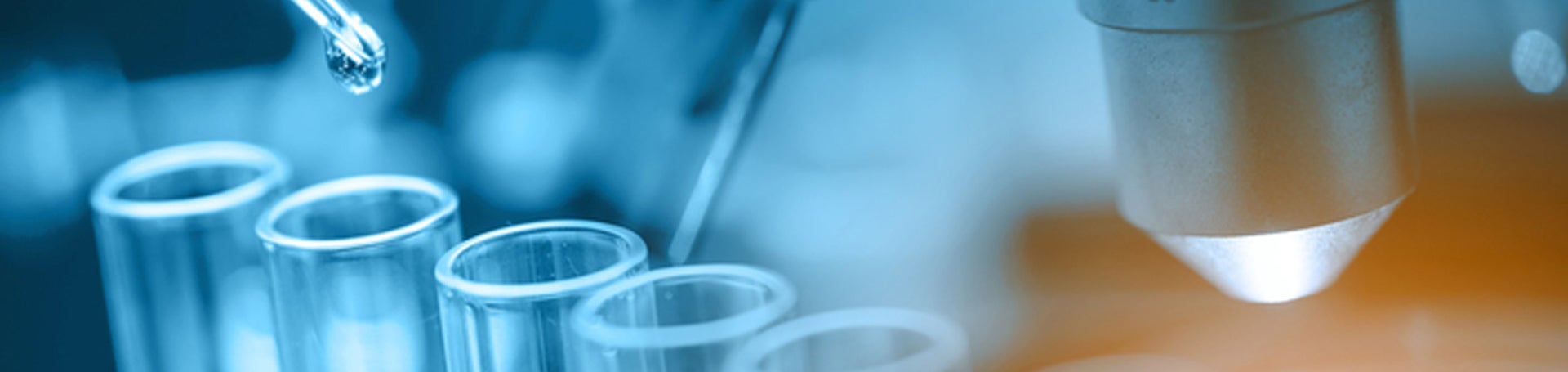 microscope with lab glassware (c) iStock