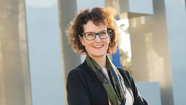 CNAS Dean Kathryn Uhrich in front of UCR sign (c) UCR / Carrie Rosema