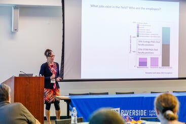 Erin Conlisk speaking at the RUSD Earth and Planetary Sciences Symposium.