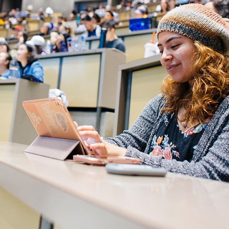 (c) UCR - student in physics classroom