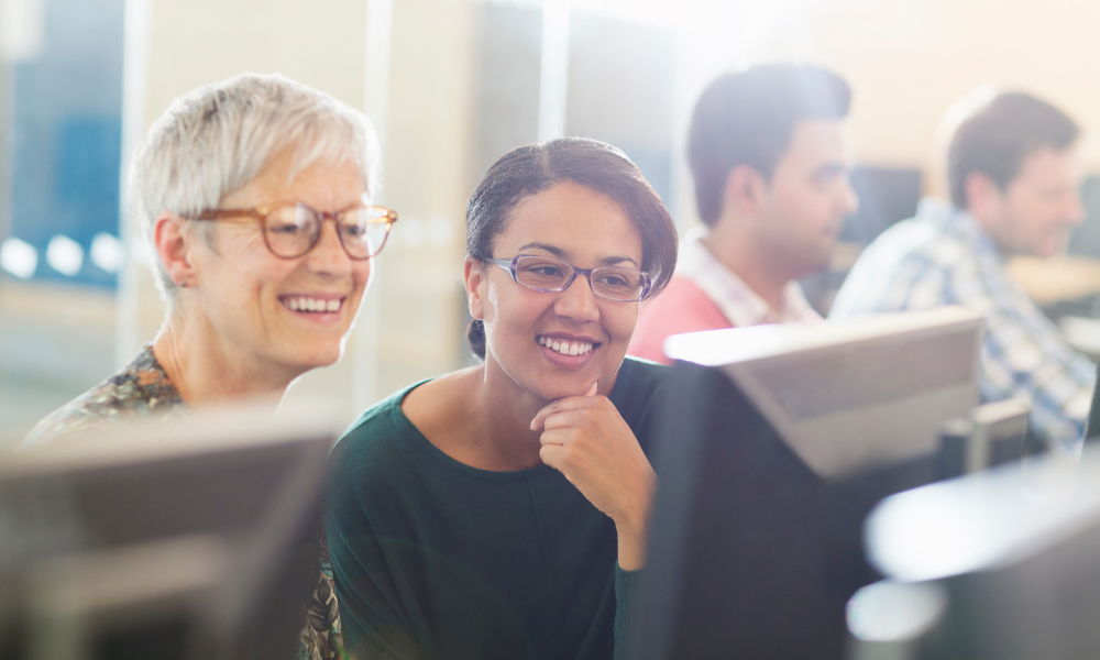 Two adult women in an adult learning environment