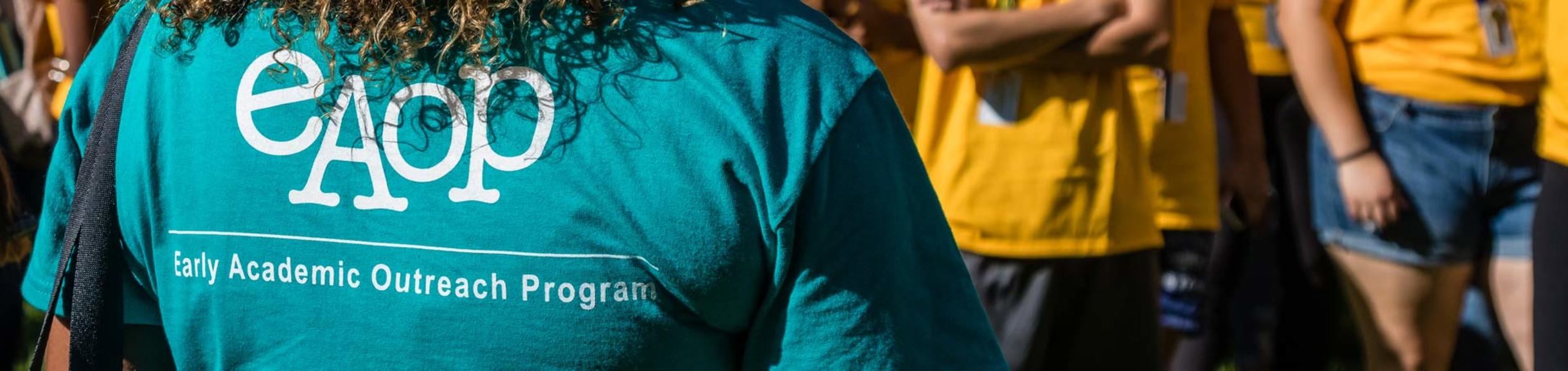 Staff and student partipants wear EAOP shirts at one of the program's events. 