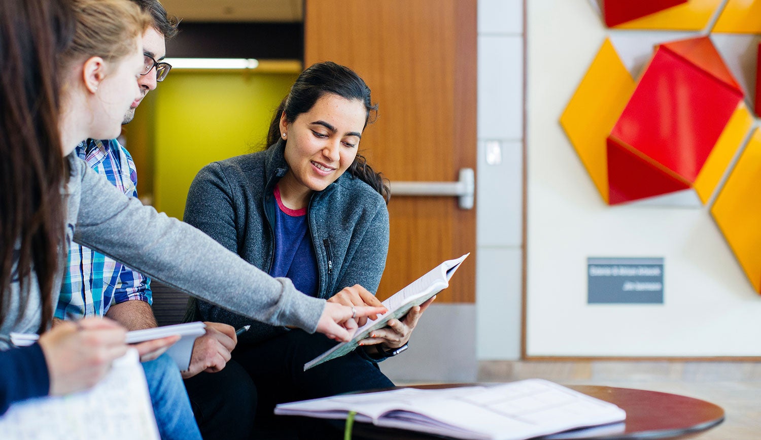 students studying at a table