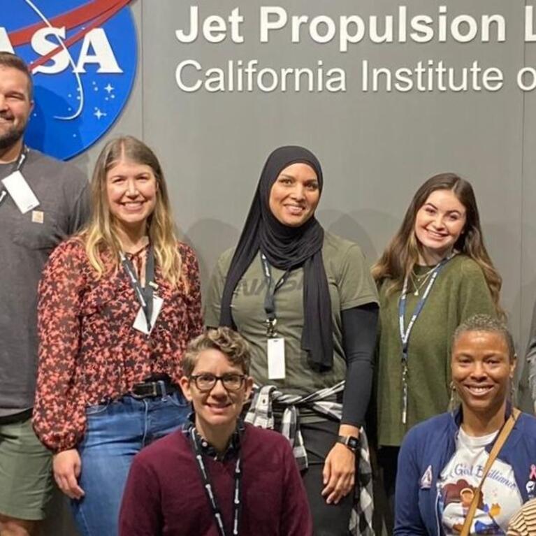 Group of educators in front of NASA JPL sign