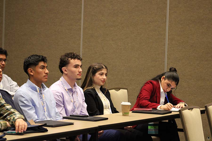 conference attendees at a breakout session 