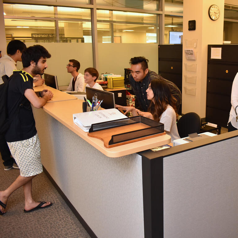 staff members working at desk