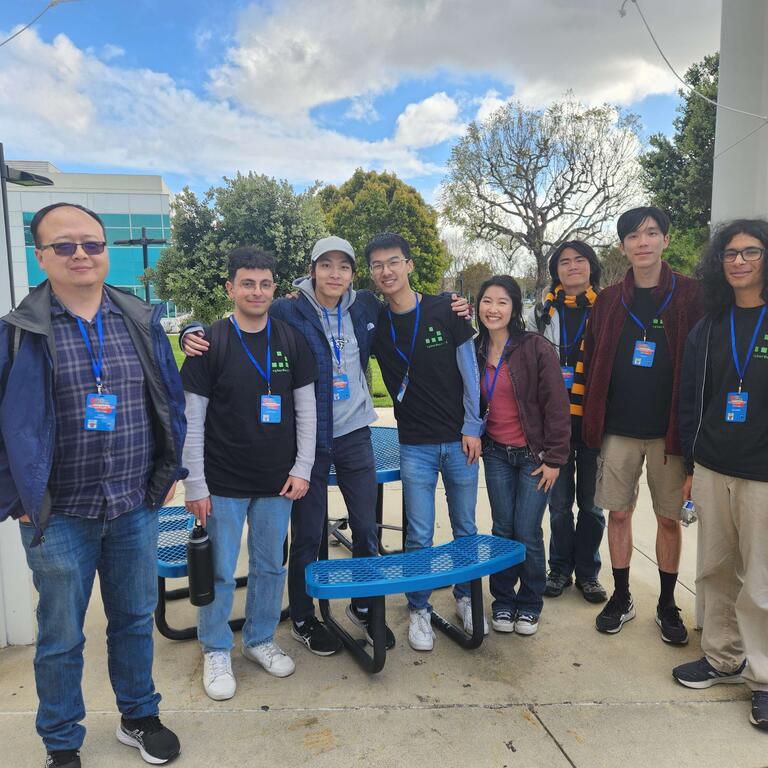 Cyber student group near table