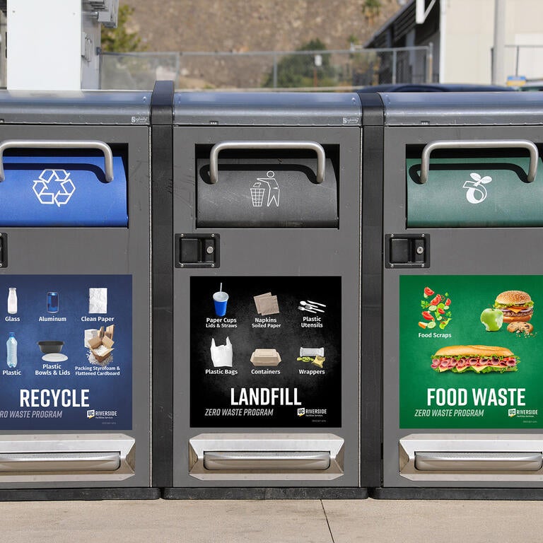 Three solar powered waste bins