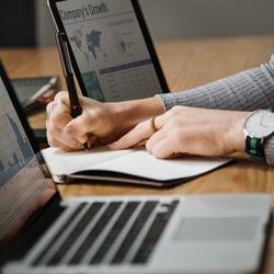 Writing on a notebook