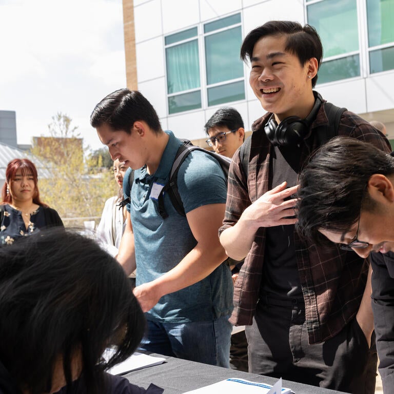 Students at sign up table