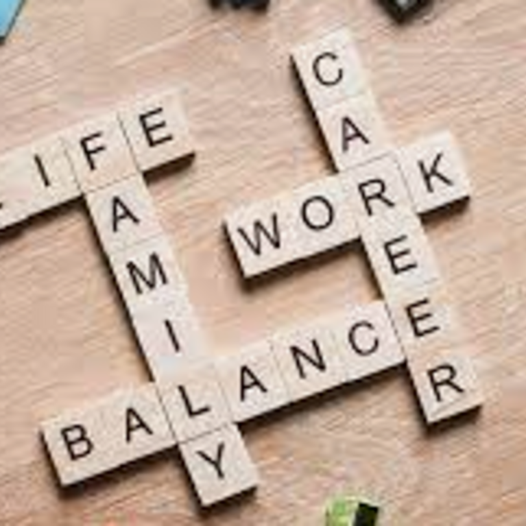 Scrabble board spelling out life, work, balance, etc.