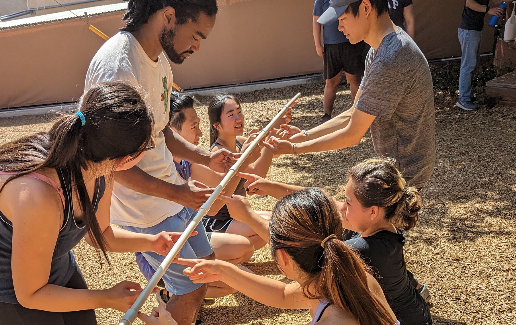 students putting pole together