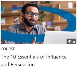 The top half of the image contains an image of a dark-haired man with a beard and glasses looking at a computer monitor with a blue swirl encircling him and the bottom half of the image contains the title of the course.