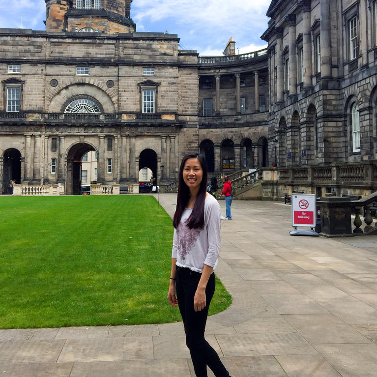 UCR student standing in front of University of Edinburgh