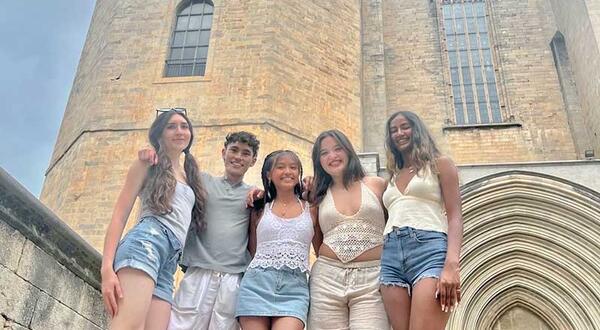 Patrick Levita with friends in front of a cathedral