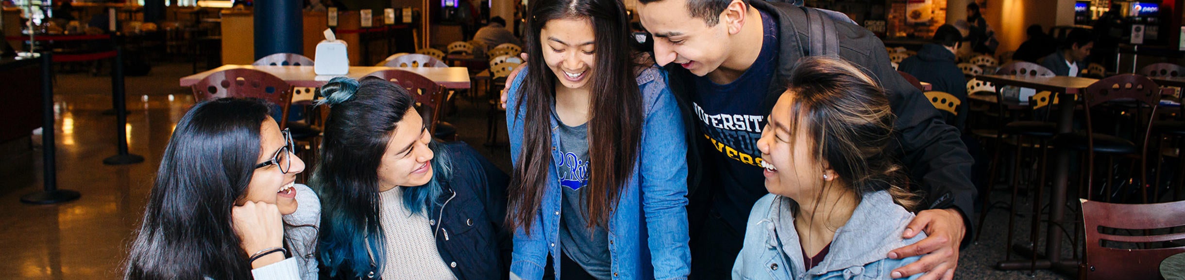 UCR students studying in HUB dining area