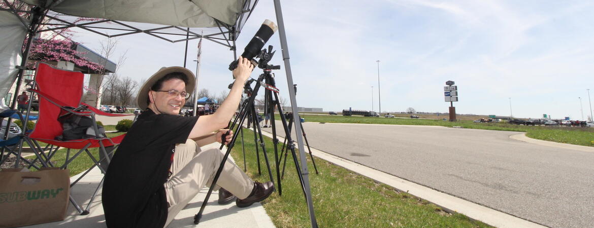 Morris Maduro gets ready to watch solar eclipse