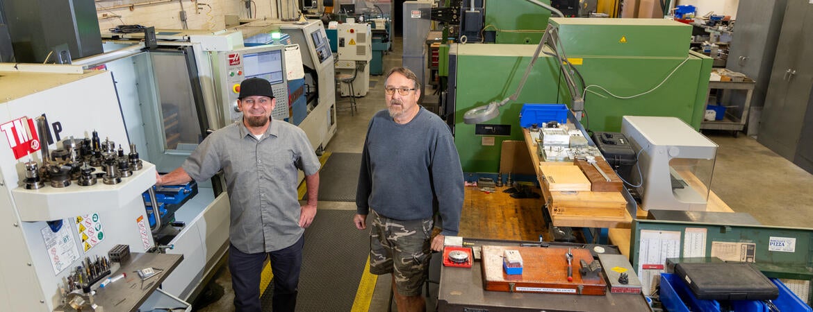 Eric Gazelle and Jay Lefler in CNAS machine and glass shop