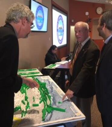 David Oglesby, professor and chair of the earth sciences department, speaks with Congressman Jerry McNerney