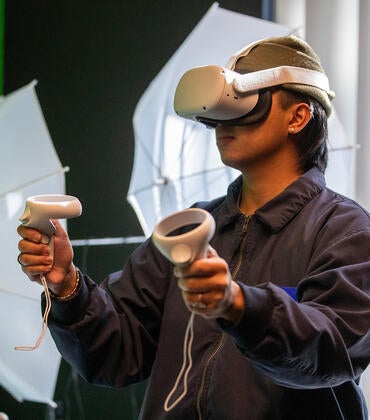 student in VR goggles