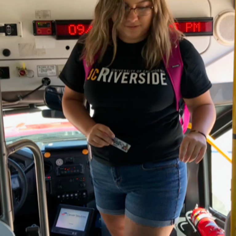 Student riding RTA bus.