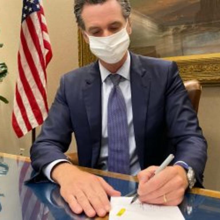 Newsom signing budget