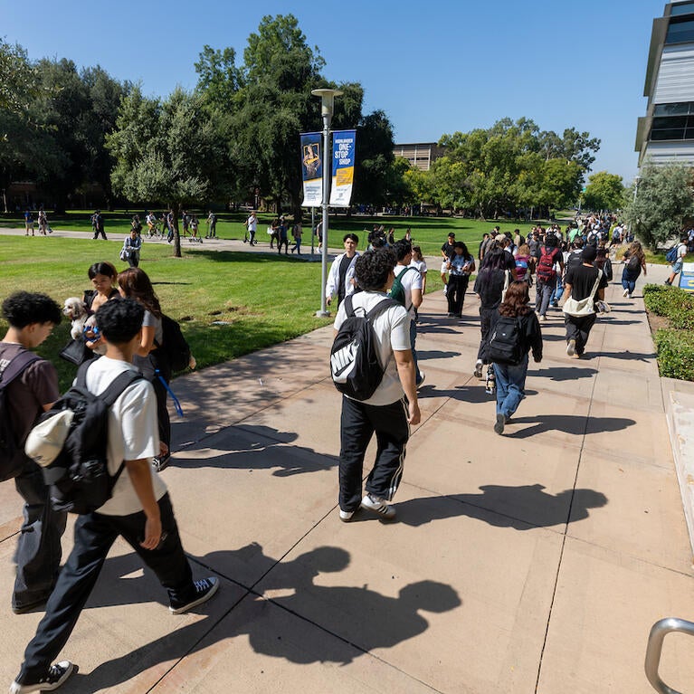 student walking to classes