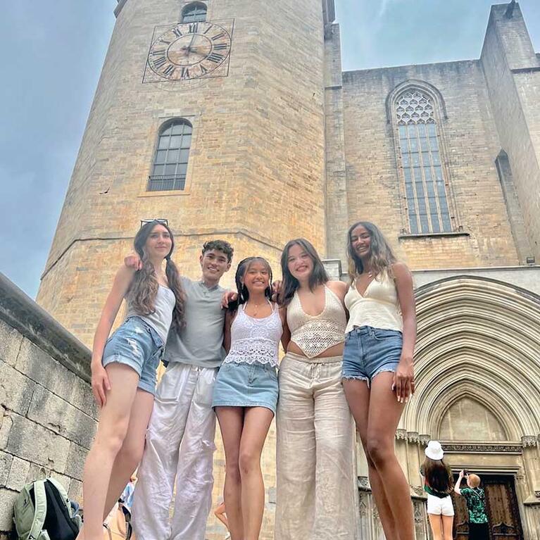 Patrick Levita with friends in front of a cathedral