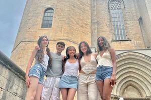 Patrick Levita with friends in front of a cathedral