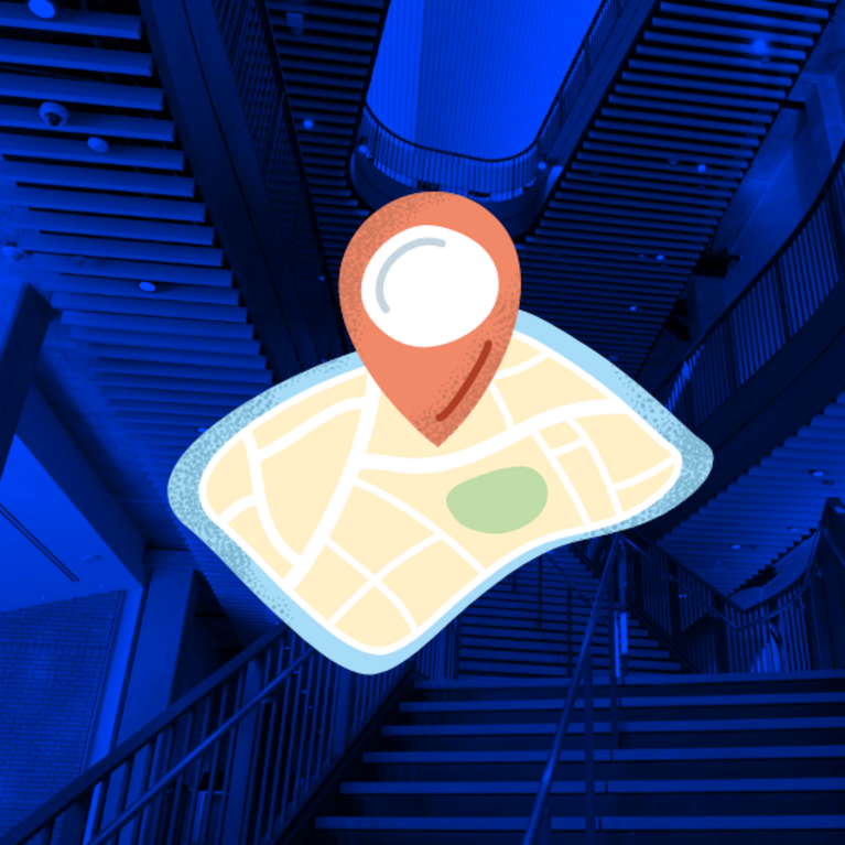 An animated navigation icon and map over the staircase at the student success center
