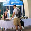 A student looks at a UCR Library table.