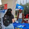 A student at views a UCR Library table.