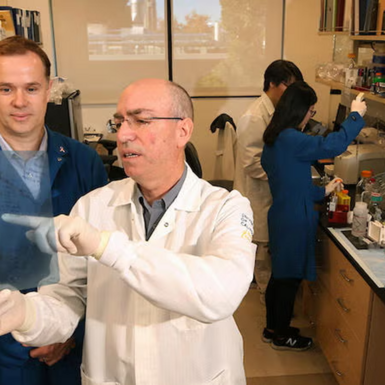 Jeff Perry, Ernest Martinez and students in the lab