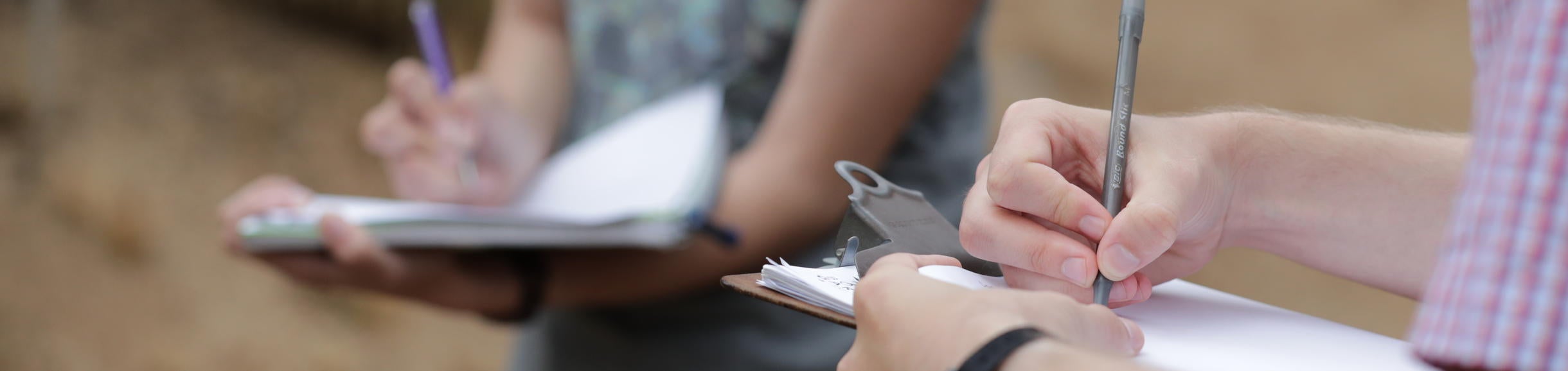 Students taking notes in Botanic Gardens