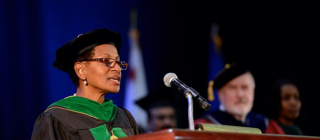 Dean Deas speaking at graduation