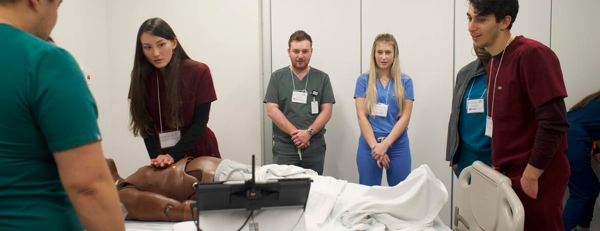 Students practice running codes at the 2023 Primary Care Summit