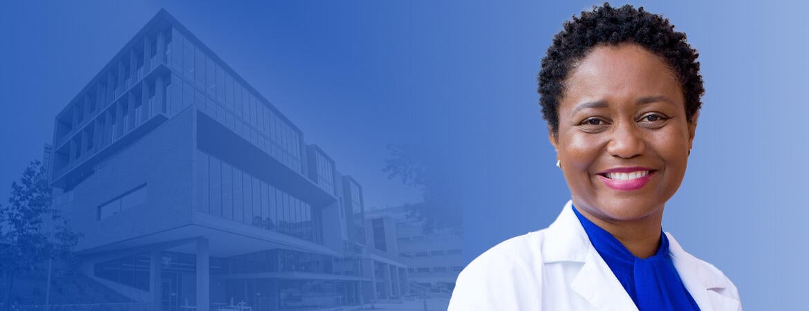 Adwoa Osei in front of the SOM Ed 2 building