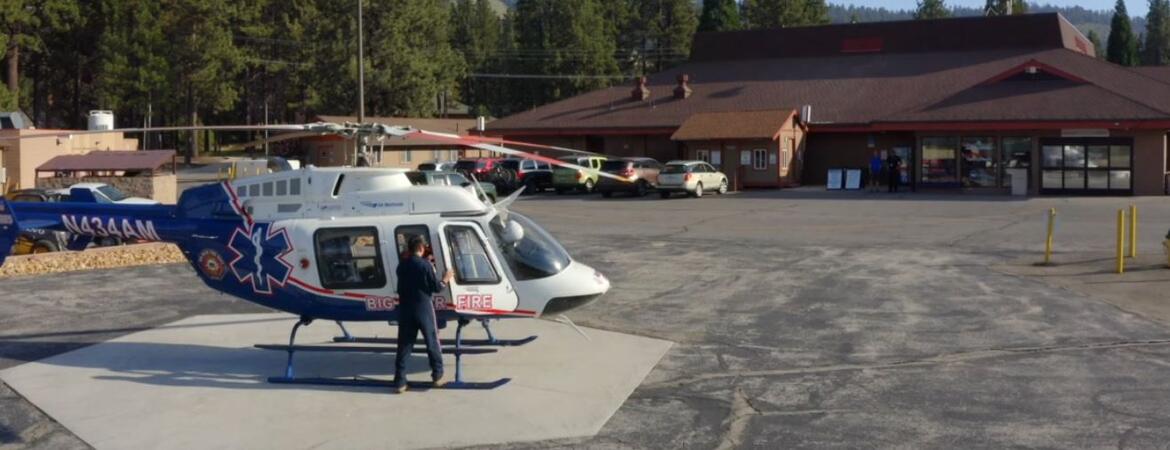 A helicopter in front of the clinic