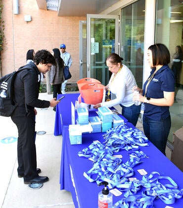 Check in table at Open House 2023