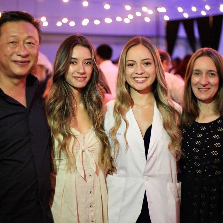 Aislyn Oulee and her family at the White Coat Ceremony in 2019.
