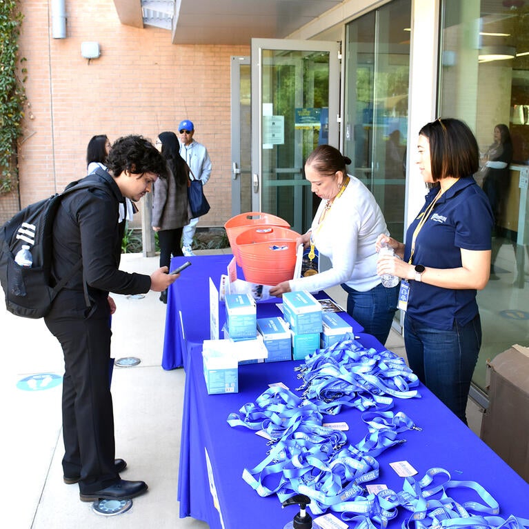 Check in table at Open House 2023