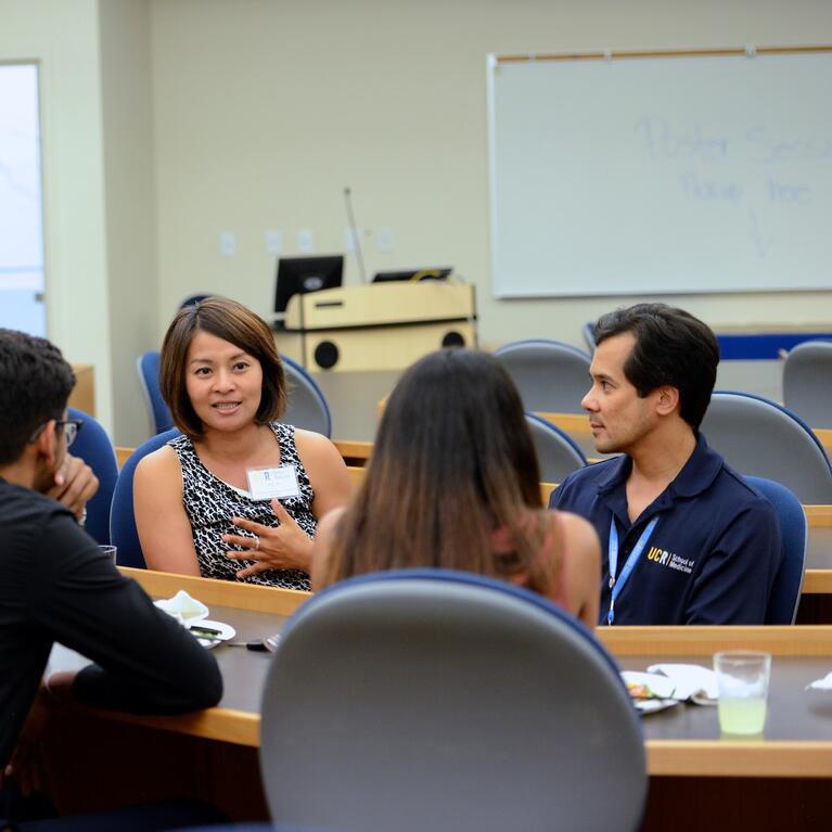 Ariel DeGuzman with medical students