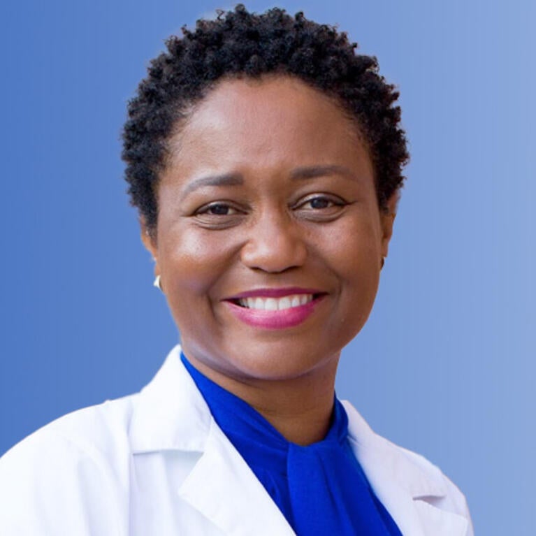 Adwoa Osei in front of the SOM Ed 2 building